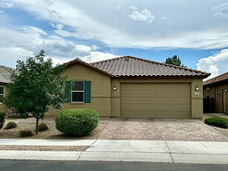 8597 N Genoa Ct — Photo 1