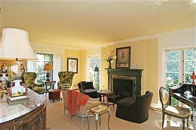 Beautiful formal living room is open to the dining room creating a wonderful flow for entertaining.