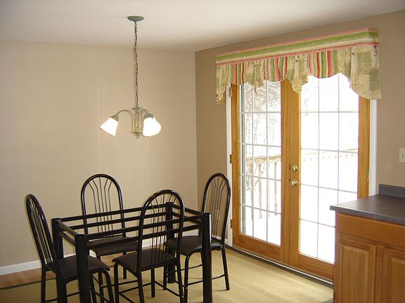 Dining w/ French doors to deck