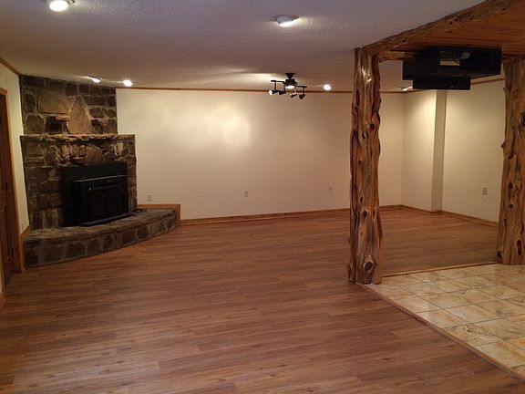 Living room with wood burning Fireplace