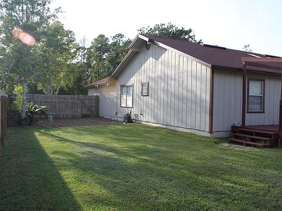 Side yard with 12 foot gate