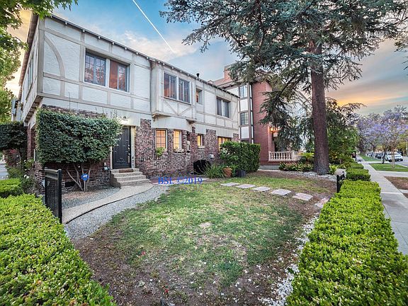 The available apartment is the top floor of the building (the beige and brown upper part).