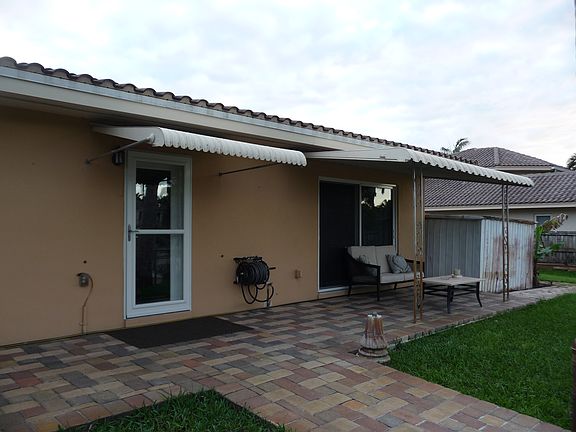 BACK PATIO FACING CANAL