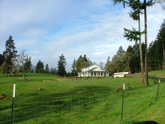 Pasture and house