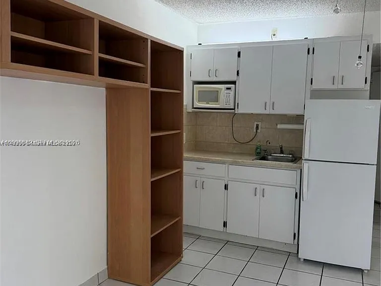 6484 Indian Creek Dr #107 — Photo 4
