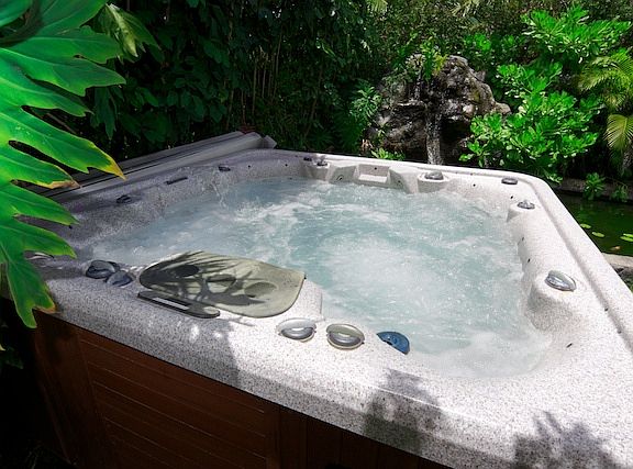 8 person hot tub by the Koi Pond