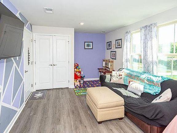 First floor entry bonus room/office space/or playroom.