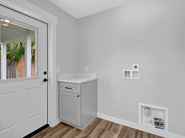 Laundry room w/connections and storage