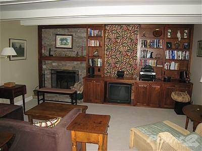 Living room cabinets and bookshelves are fashioned from oak that came off the property.