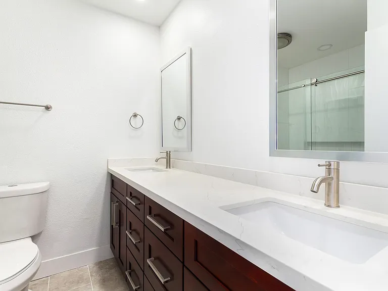 Downstairs bathroom with double sinks