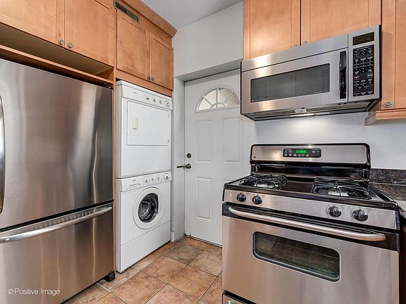 In-unit W/D, brand new microwave, large refrigerator with bottom freezer.