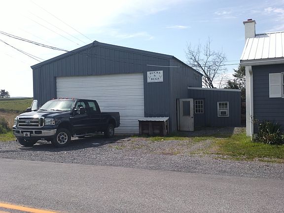 Large garage with small attached workshop