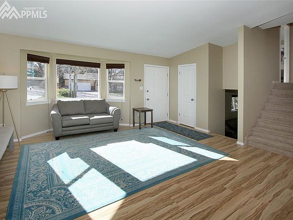 Living Room on main floor with Bay Window.
