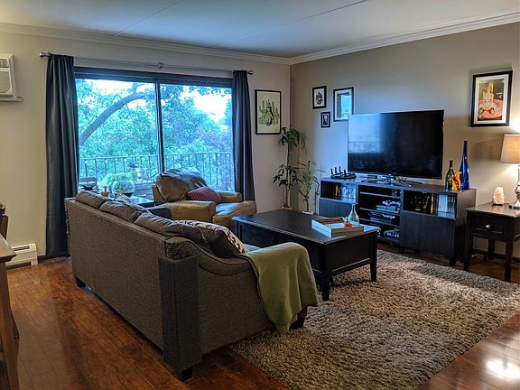 Living room, patio door in the back.