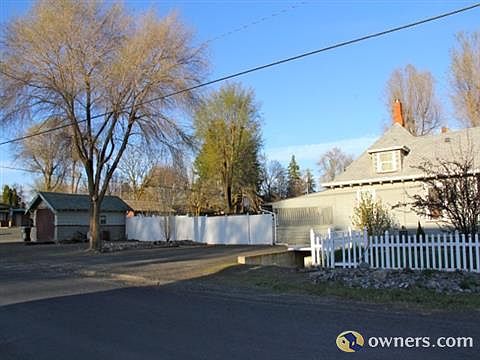 6' privacy vinyl enclosing back yard.