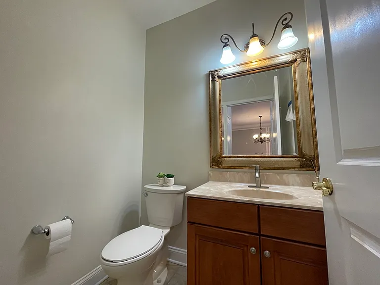 Convenient main-level powder room for guests and everyday use