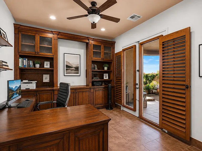 Dedicated office space with 2 desks and built in cabinets.