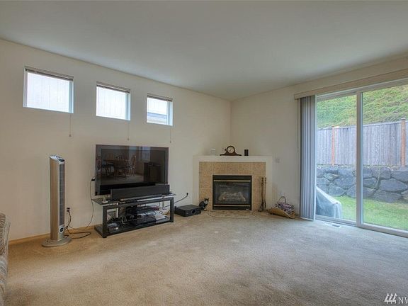 Spacious Family room with gas fireplace. 