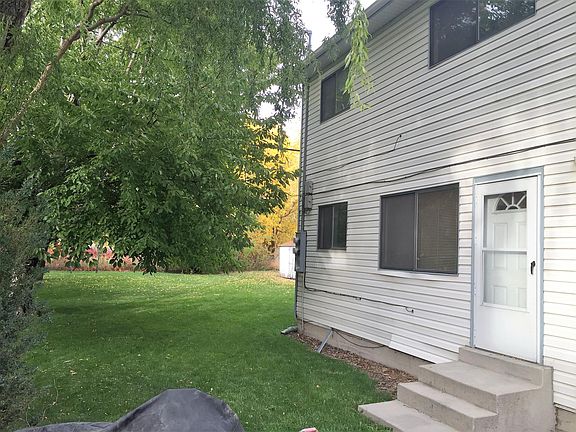 Back yard and 2-Story home posted, in back