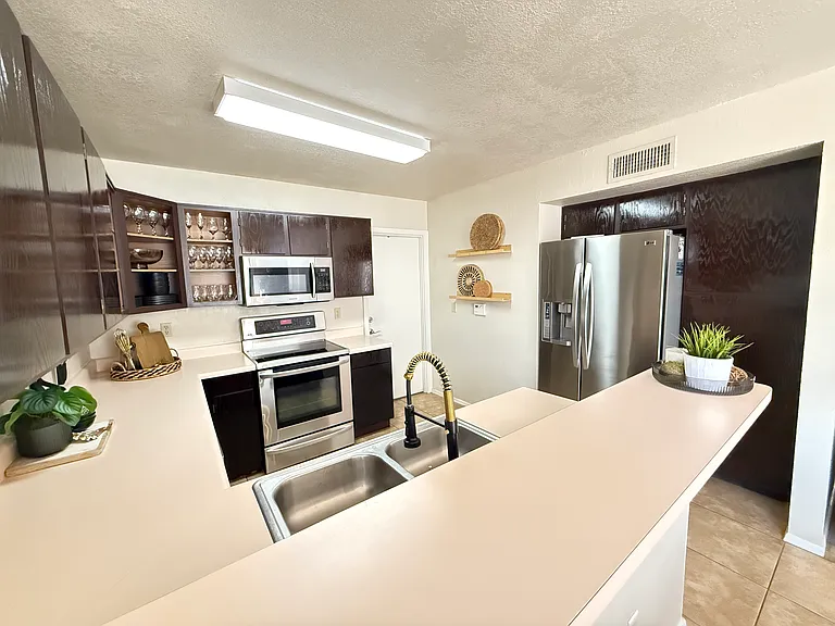 8713 W Bluefield Ave — Photo 9