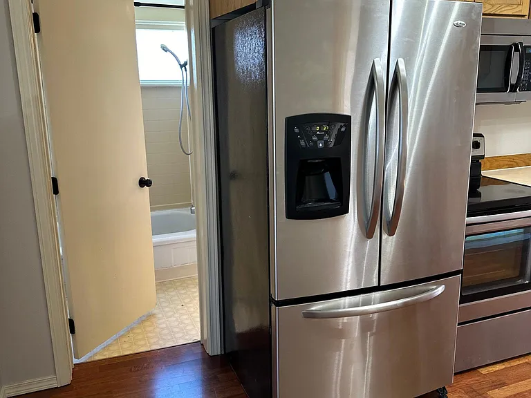 Full bath off Kitchen