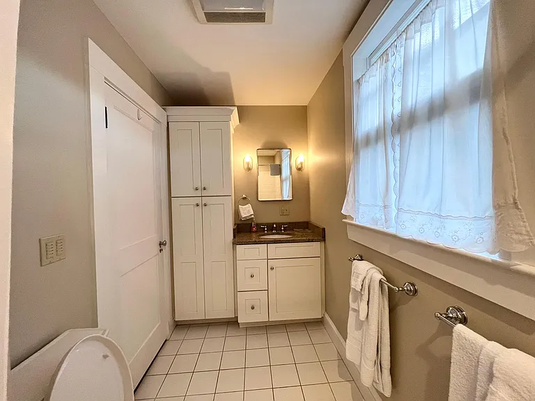 First floor bath with shower (one of three full baths)