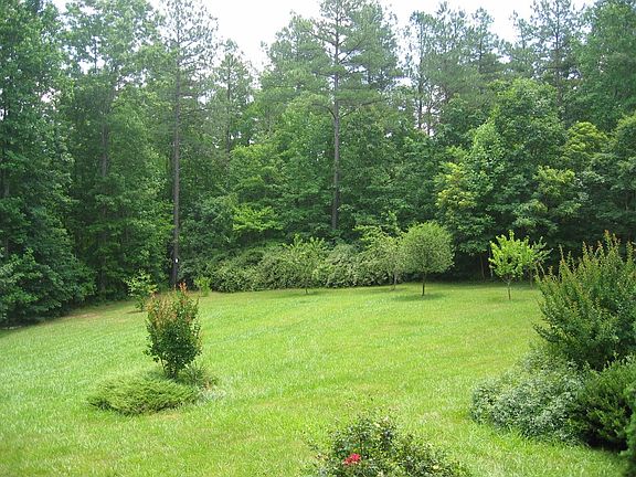 View of park-like front yard from front porch