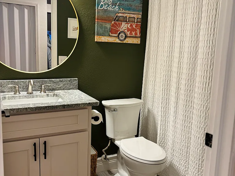 Updated bathroom with large tub.