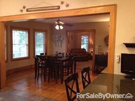 dining room with oak floors
						:
						walk from kitchen into dining room, great for entertaining !!