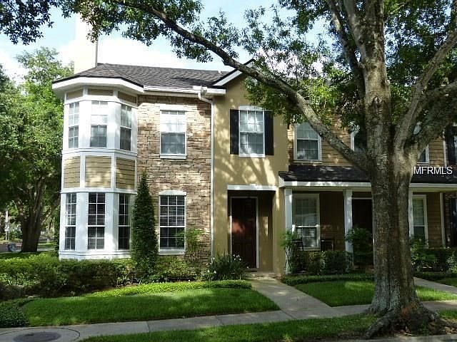Gorgeous Winter Park townhome on tree lined street.