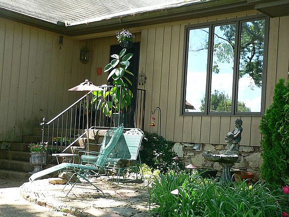 stone patio with lake view