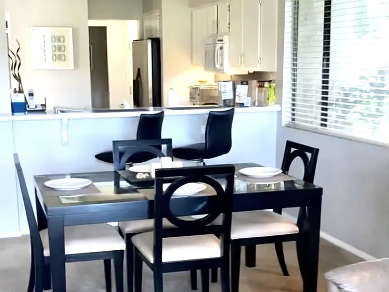 Dining area looking into kitchen.