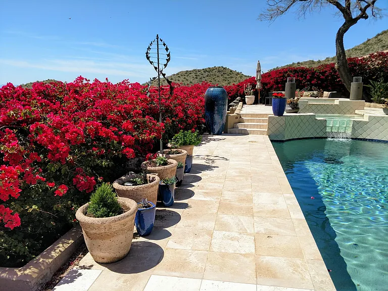 Lush bougainvillea provide privacy and a gorgeous frame for the panoramic views