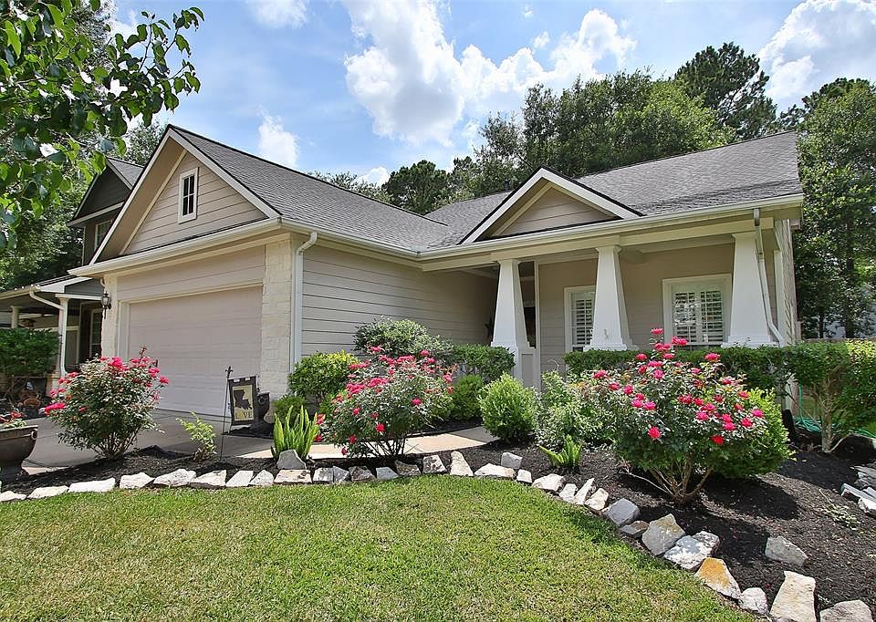 This delightful one story, 4 bedroom home exudes warmth and charm. Pretty curved flower bed and winding walkway lead up to the f
