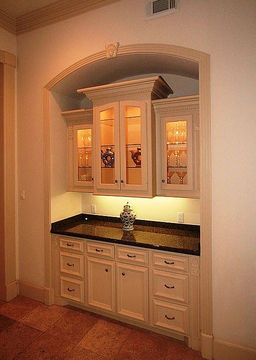 Built-in hutch located between Kitchen and Formal Dining Room.