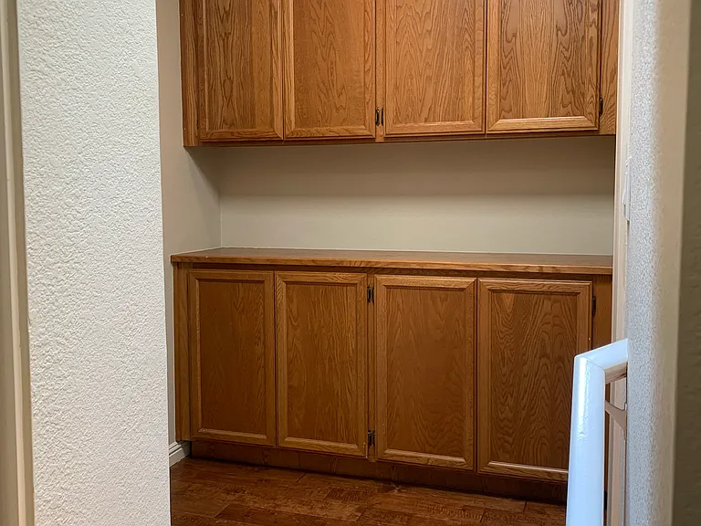 2nd Floor landing area with Storage cabinets.