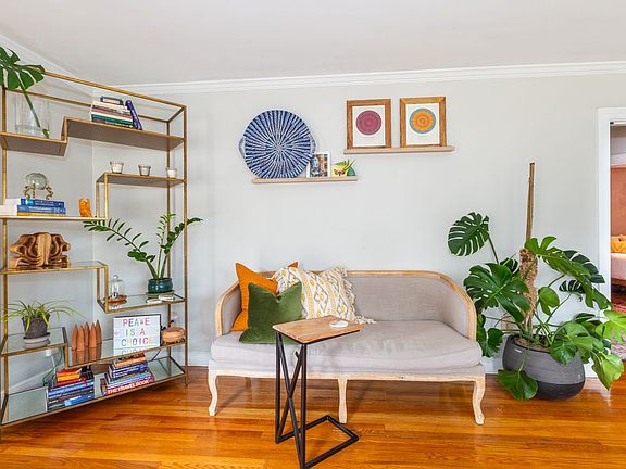 The first of two living rooms upon entry to the home.