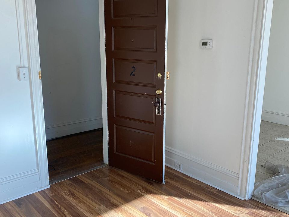 Enter into the living room which is 14 by 14 and two large windows.