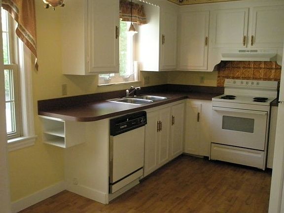 Updated kitchen with newer appliances that stay.