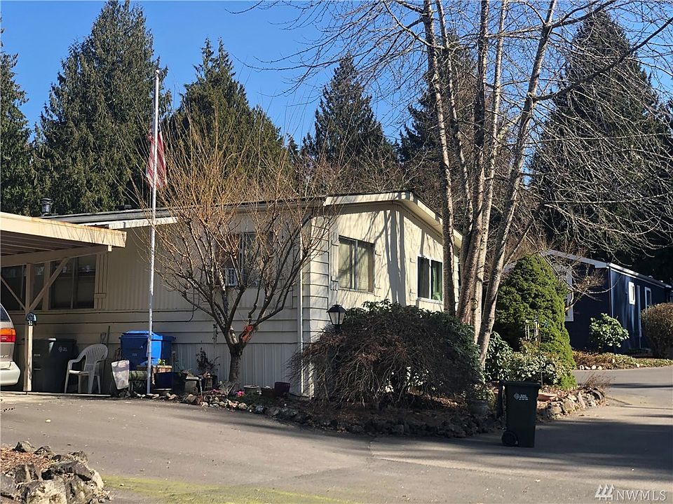 Entry is through the carport. Home is 1,436 sq ft of spacious living.