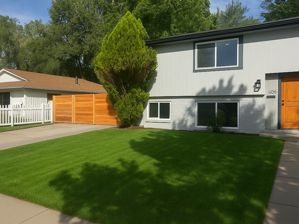 Your parking spot with a fence that leads to your private entrance.