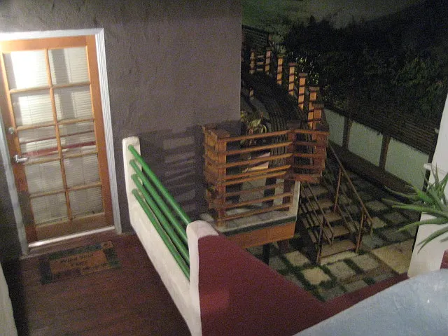 Bridge connects to Carriage House and view into courtyard.