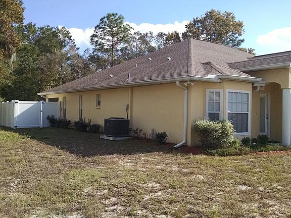 Side of Duplex showing Fenced-in backyard