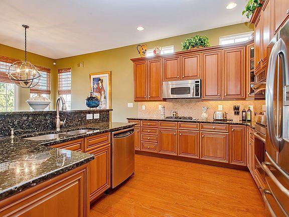 Top-of-the-Line Kitchen - SS Appliances - Granite - HW Floor