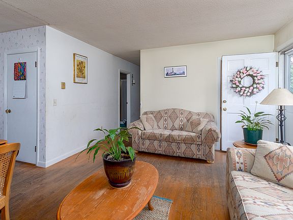 Hall leads to Bedrms and BR.