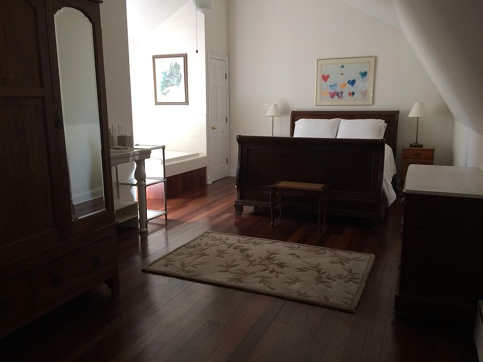 Bedroom space is roomy and enjoys natural light.