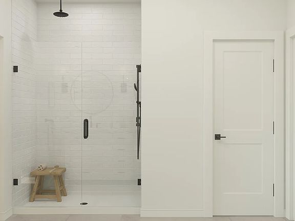 Primary bath with glass shower enclosure