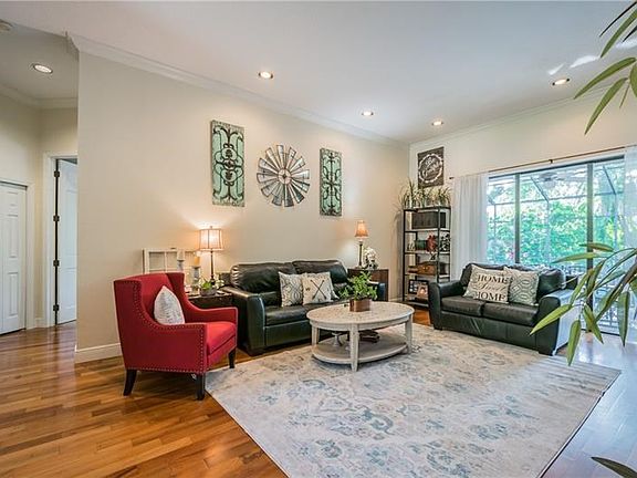 Brazilian pecan style flooring contrasts beautifully with the color scheme and crown molding! :-)
