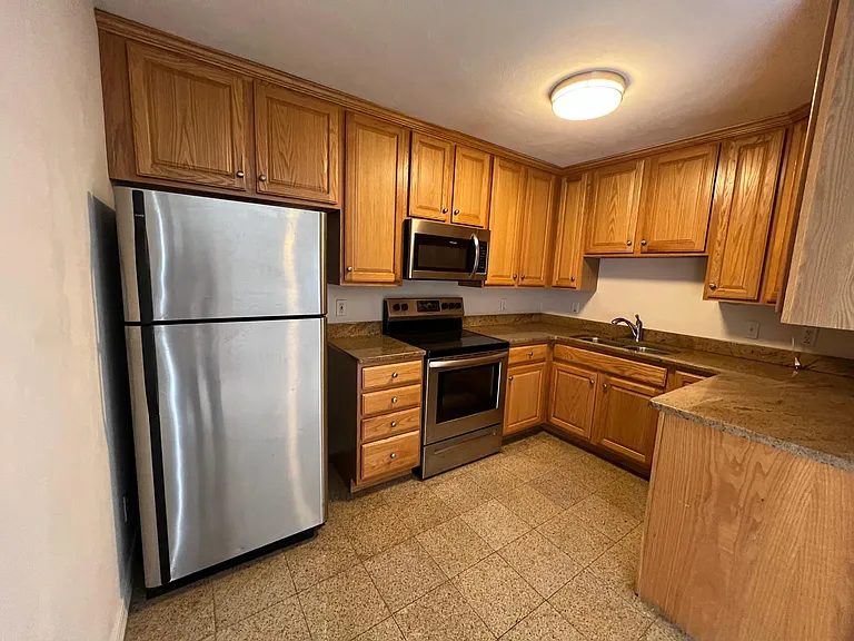 Lots of cabinets for storage.