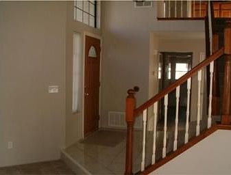 This tiled entry is a great place to greet friends and family